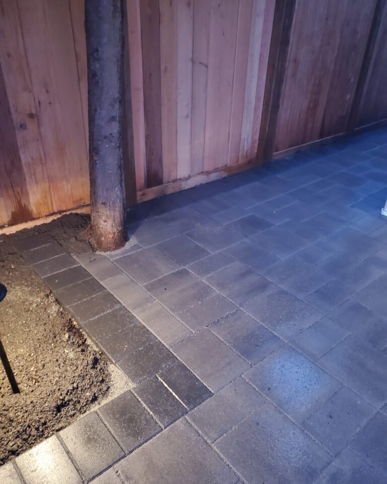 A Backyard Transformed: Synthetic Turf Meets Elegant Pavers