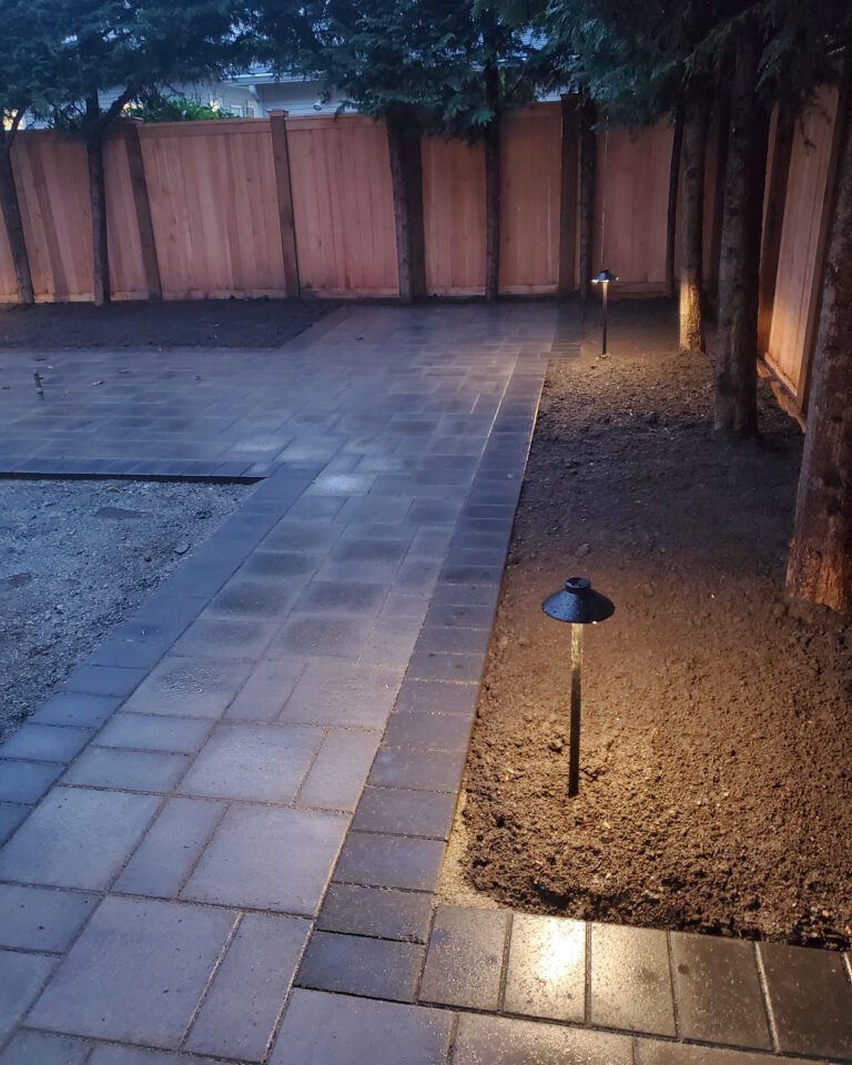 A Backyard Transformed: Synthetic Turf Meets Elegant Pavers