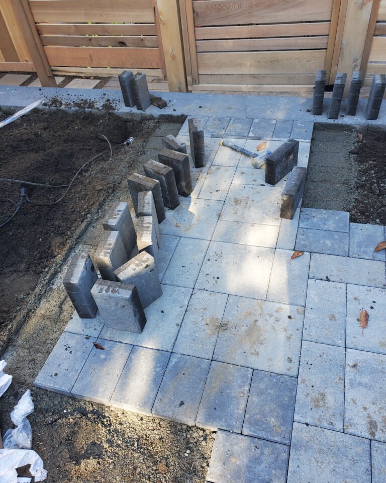 A Backyard Transformed: Synthetic Turf Meets Elegant Pavers