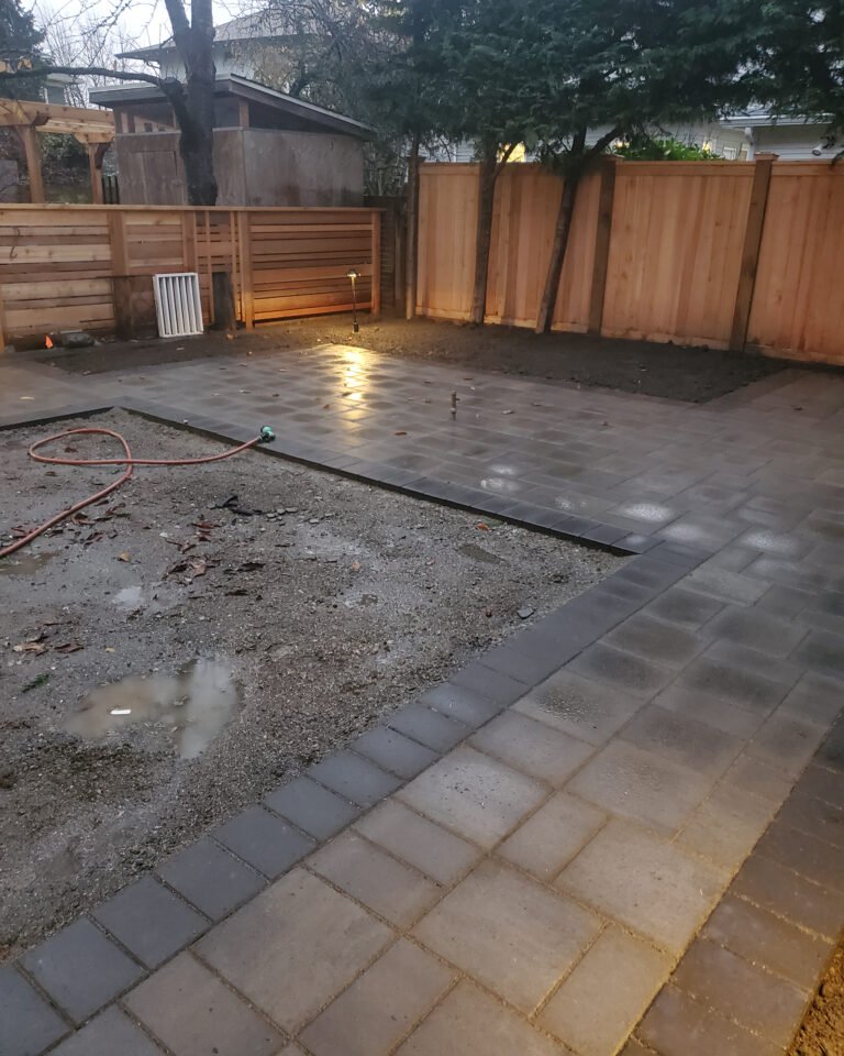 A Backyard Transformed: Synthetic Turf Meets Elegant Pavers