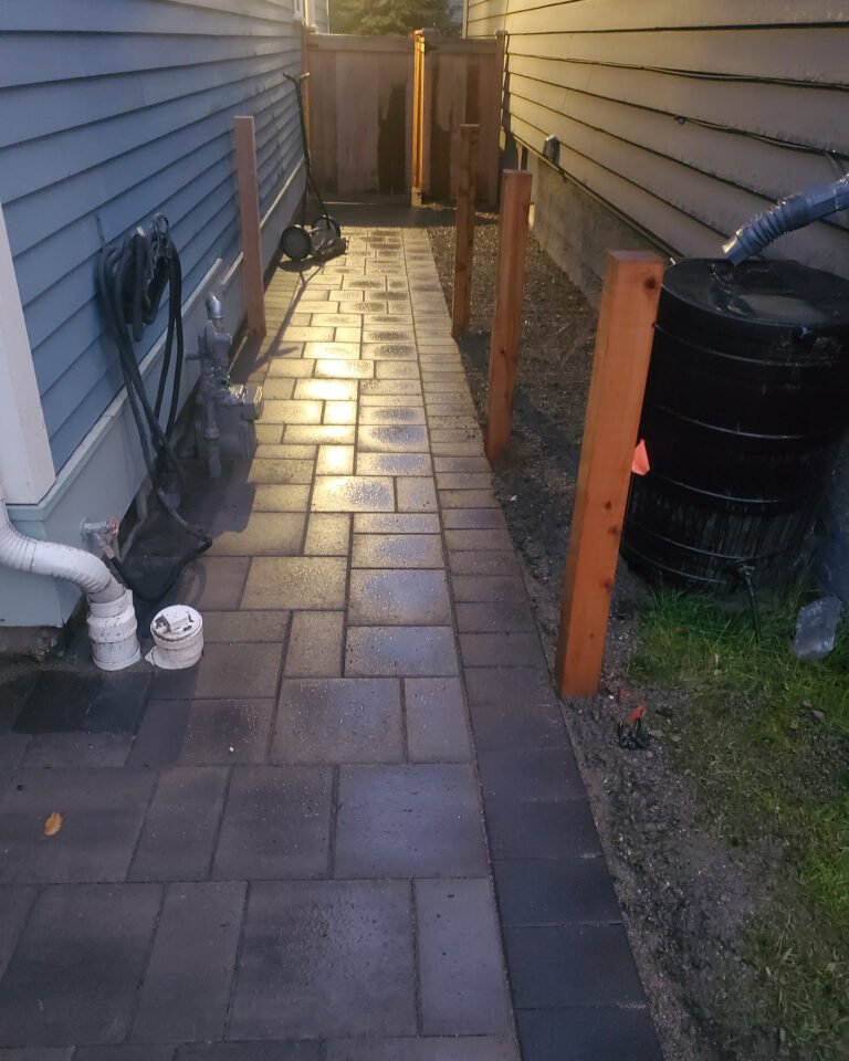 A Backyard Transformed: Synthetic Turf Meets Elegant Pavers