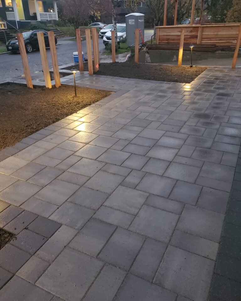A Backyard Transformed: Synthetic Turf Meets Elegant Pavers
