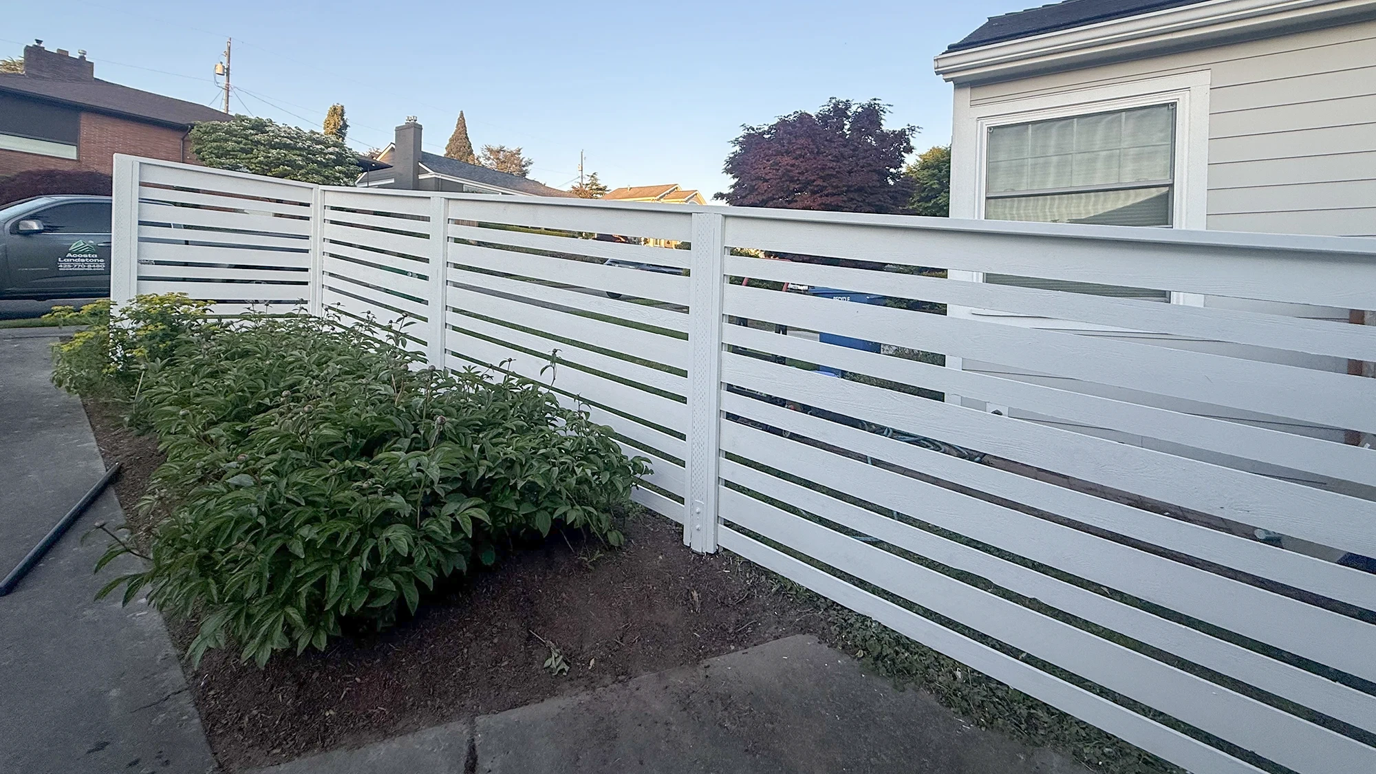 White Privacy Fence Installation in Seattle, WA by Acosta Landstone