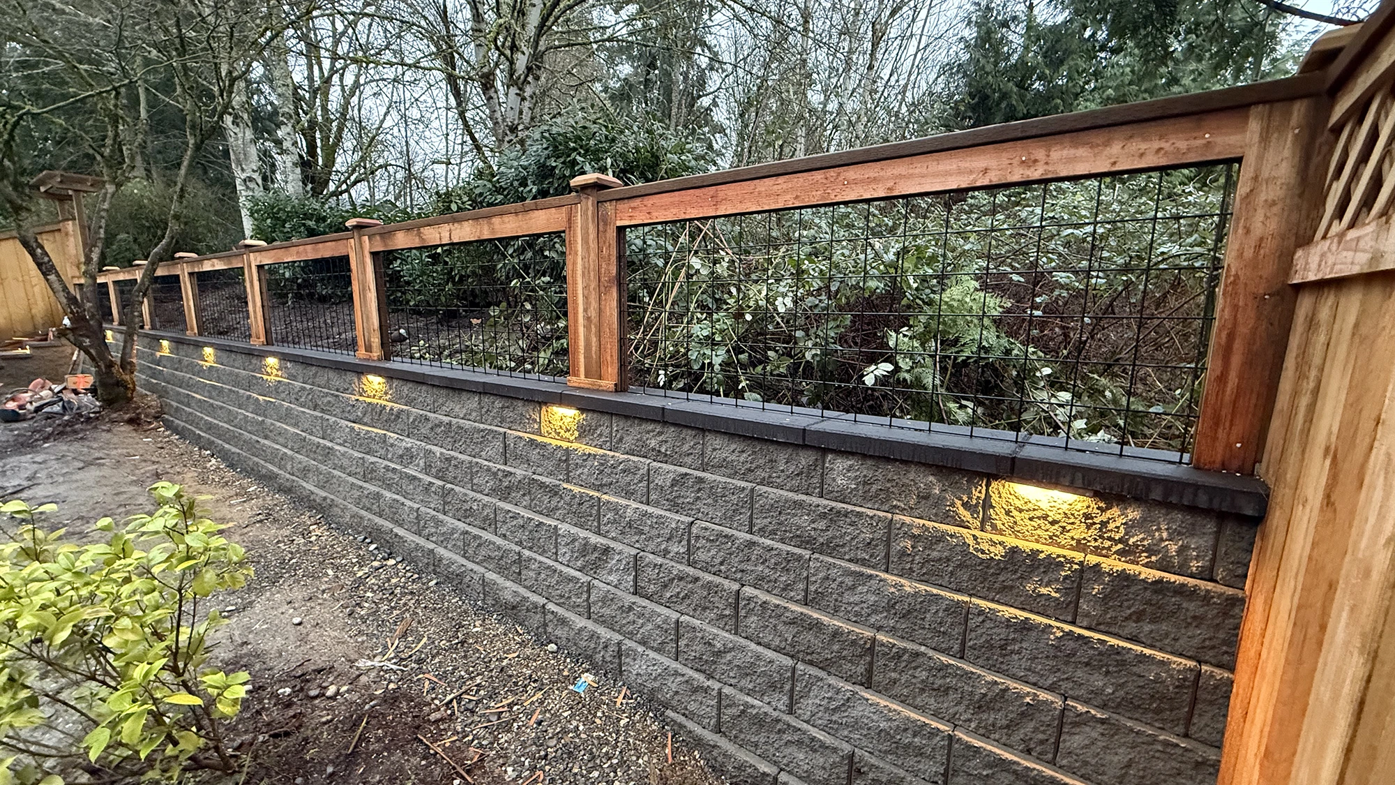 Backyard fence and paver walkway details in Sammamish, WA