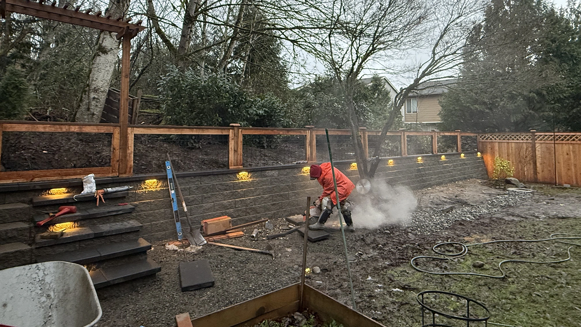 Finished backyard fence and hardscape details in Sammamish, WA