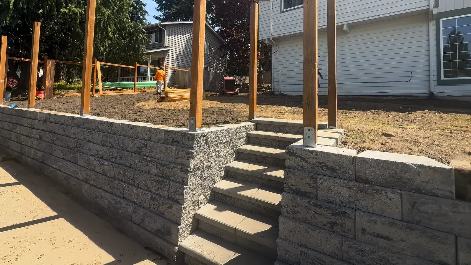 Finished retaining wall and block stairs with step caps in Federal Way, WA