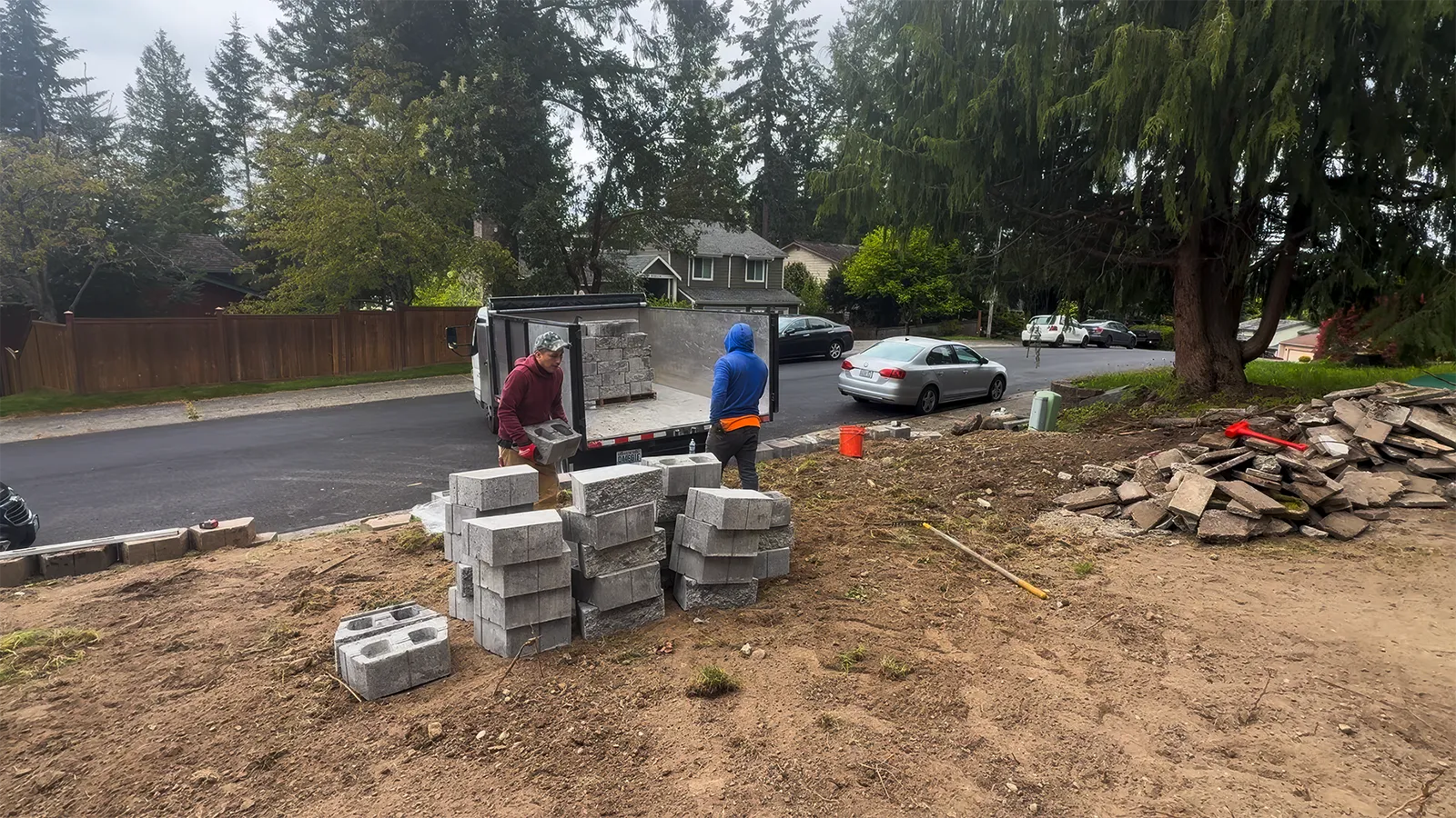 Retaining wall blocks, drain pipe and materials on site in Federal Way, WA