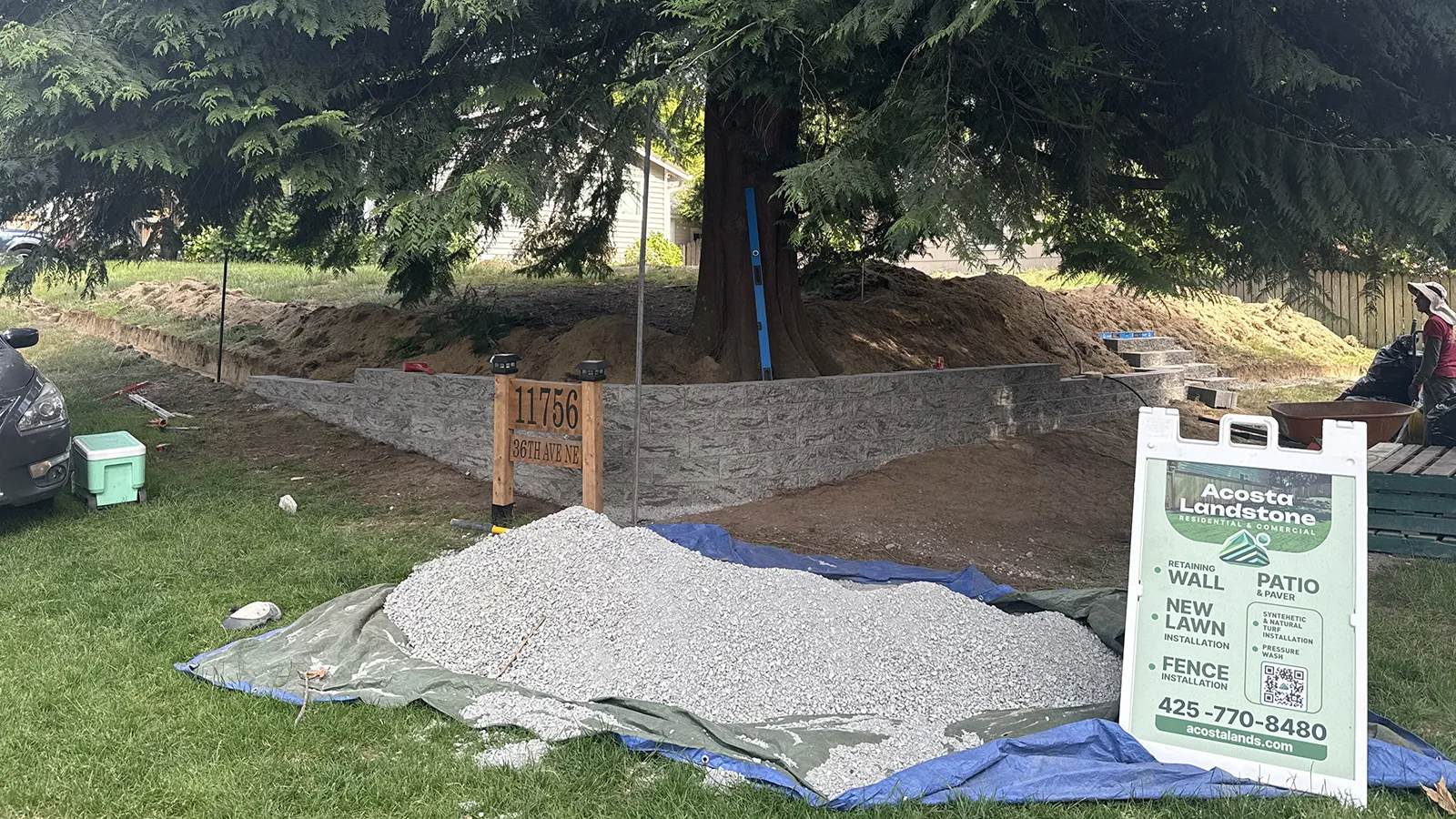 Retaining wall rising along the corner lot in Seattle, WA