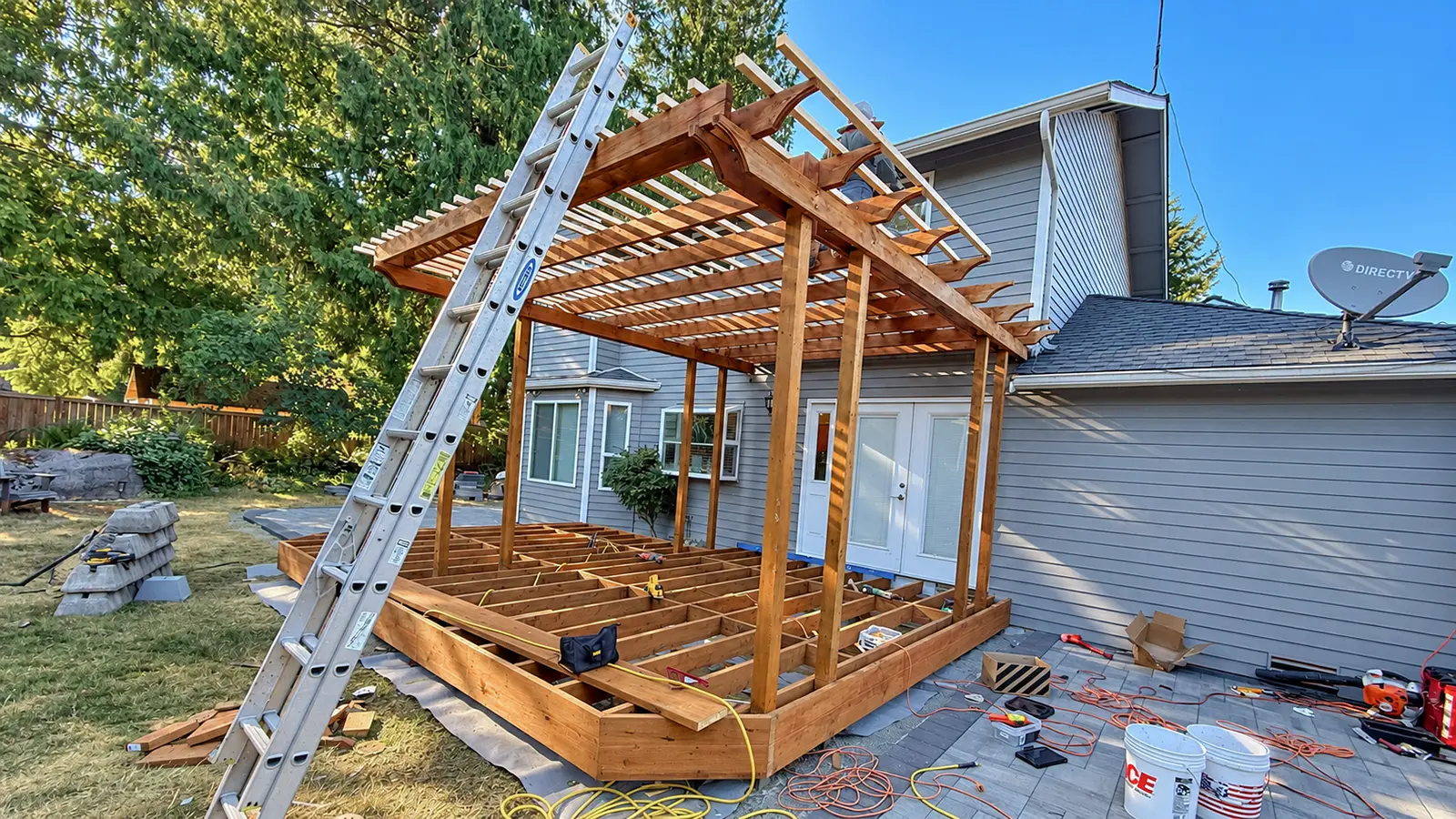 Wood pergola rafters and deck frame during construction in Duvall, WA