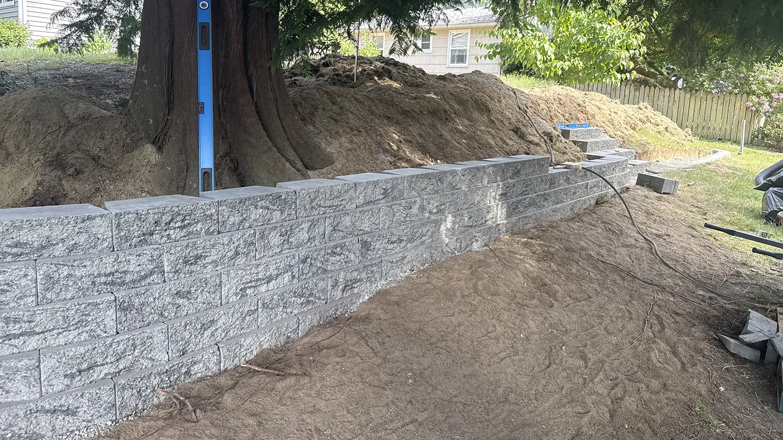 Finished retaining wall blockwork leading to block steps in Seattle, WA