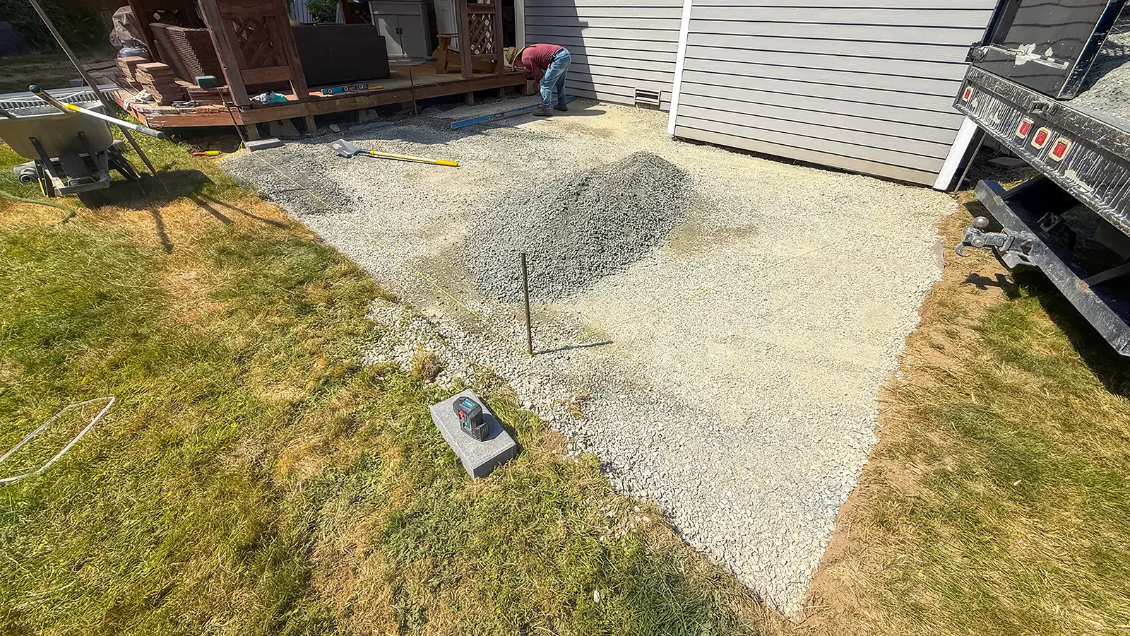 Compacted gravel base preparation for a paver patio in Duvall, WA